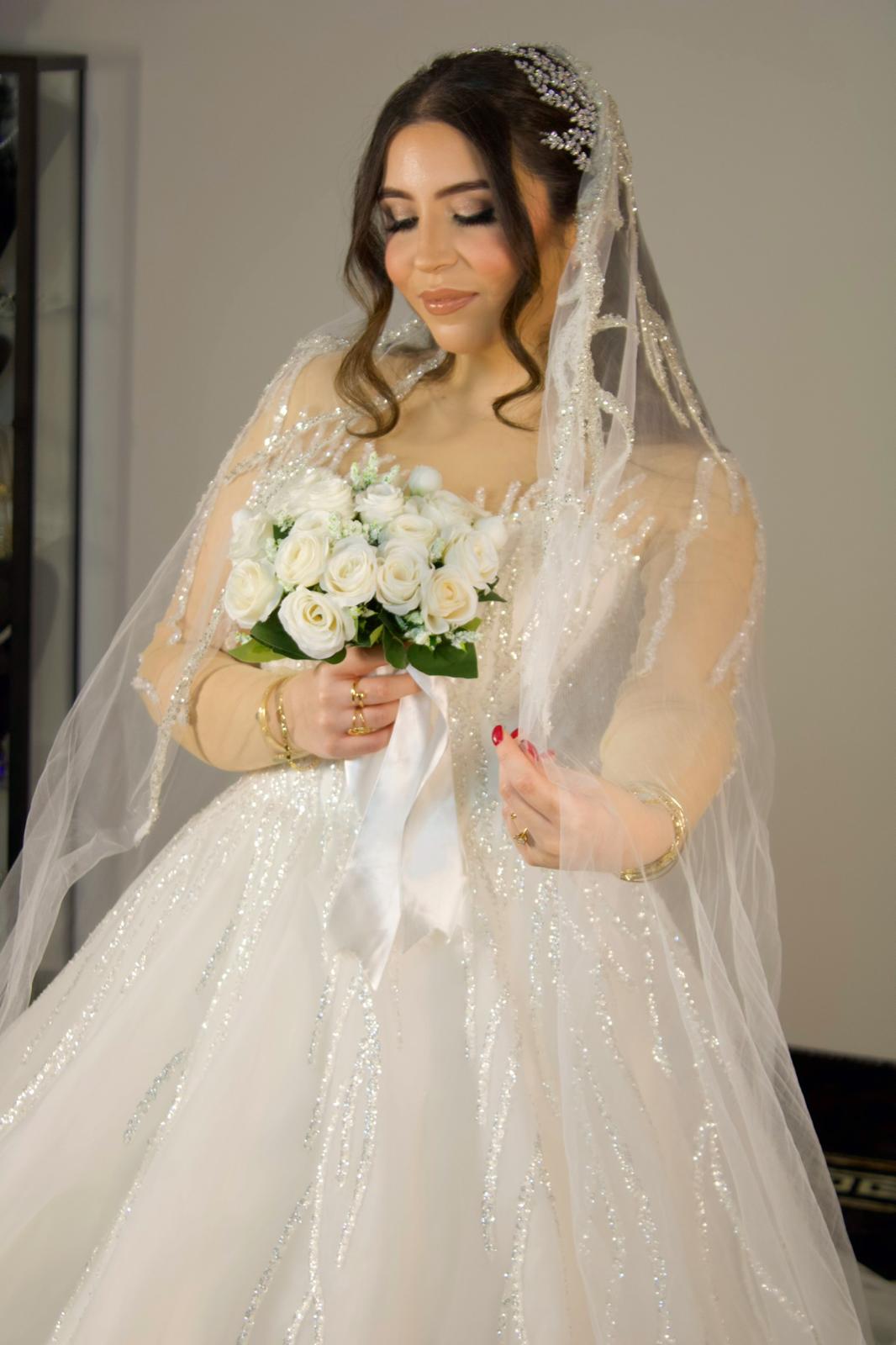 Bride with bouquet and veil